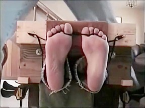 Feet tickled in stocks1