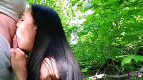 Black-haired teen gives a blowjob, gets fat dick&#x1F346; to ejaculate in woods