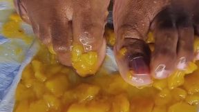 Tinas Flat Feet - Peaches Smash - A close up sensory-rich video of feet smashing ripe peaches, creating visually engaging blend of textures and sounds