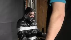 Alice Taped To A Chair And Tapegagged In Shiny Nylon Downjacket