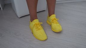 Wiggling my toes in my soft yellow sneakers aa