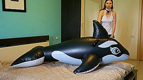 Housemaid pop and deflate big inflatable whale Full HD