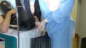 Doctor Fists and Sounds Latex Slave with Gloves in Gyno Chair