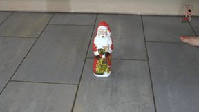 Santa under Christins feet