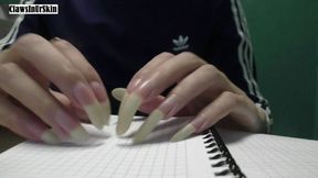 Nails scratching paper