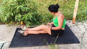 Roxan scratching her legs and feet due to itchy feet (3)