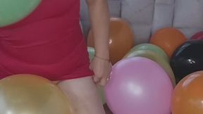 Sexy Latina playing with balloons