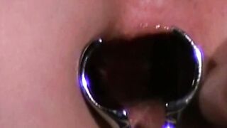 Brunette in a dental gag trained to obey without question