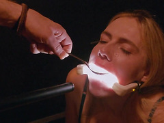 Filthy closeup of submissive whore playing with frozen cum