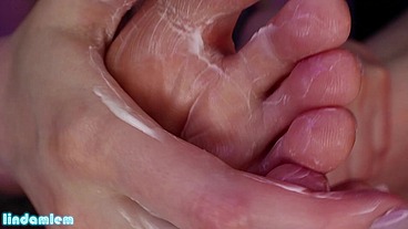 Moisturizing my pink toes and soles