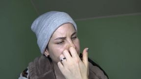 Anna Is Freezing and Picking Her Nose in a Cap at Home
