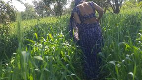 The native daughter-in-law of the village shows her beautiful son-in-law in the open air on the farm, shows her backyard, her slim waist, her tightness in the forest of the open field.