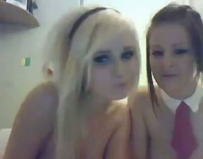 Lusty couple of perky boobed lesbies show off their assets on webcam