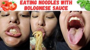 Eating noodles with Bolognese sauce