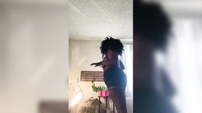 BBW wearing short denim shorts, sniffing