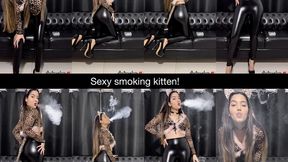 Sexy smoking kitten in leather pants and heels!
