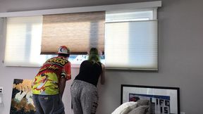 Couple Spying Through Neighbor's Window