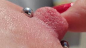 Pierced Nipples Up Close on Balcony