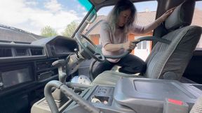 she cleans her van with blue vacuum cleaner