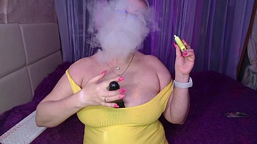 A cool busty vulgar mature whore in glasses with a ponytail on her head...