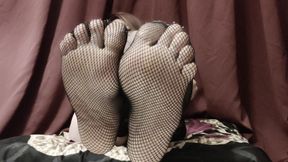 Feets in stockings close up