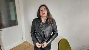 she will zippering her leather jacket