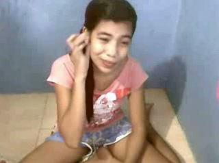 Skinny Fillipina bitch gets naked in front of webcam