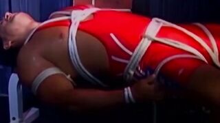 Tattooed man in uniform is bound and cant release himself