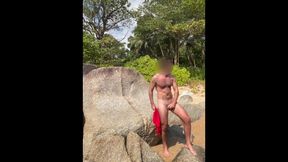 Wanking off on the beach in thailand and spunking in the water. Public fap off