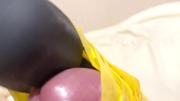 Masturbating With A Rotor Wrapped Around His Shaved Johnson