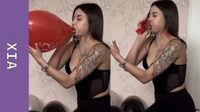 Xia’s Popping Temptation: One Balloon at a Time