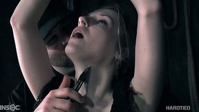 Tied up tramp Violet October gets punished in the dark basement