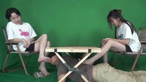 Two goddesses playing with slaves, smelling and licking their feet!