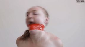 Captured Kerry hard and tough tape wraparound gag, naked on bed trying to escape