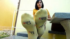 yellow socks and bare feet Sumi