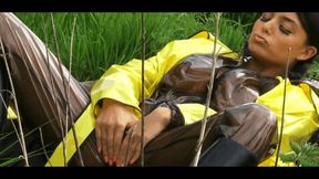 On the meadow In the plastic raincoat bodysuit outfit and rubber boots - Part 1 of 2