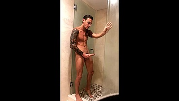 I take a hot shower playing with my hard cock for a fan