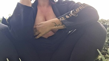 Beautiful italian milf shows you boobs while smoking in the garden