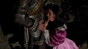 veronica de souza is laying against some large rocks, while her knight in shining armor is...