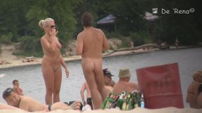 Enjoying the breeze and sunbathing naked on a beach