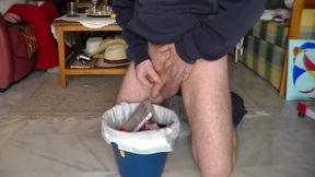 John is Peeing in all in the Trashcan