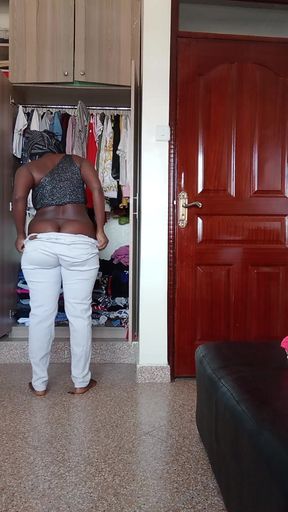 Topless Ebony Amateur Playing with Her Huge Boobs