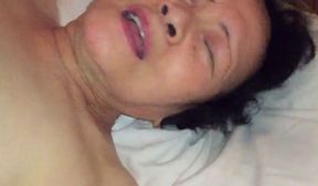 Horny Japanese granny gets her pussy drilled
