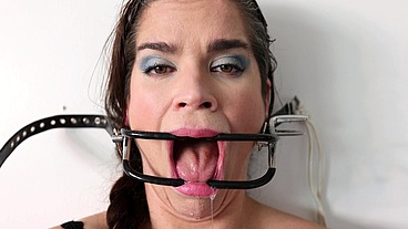 Extreme gag predicament - nailed to the wall
