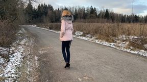 girl in high-heeled shoes walked home through the forest but fell and twisted her ankle