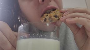 Cookies and milk play (chewing closeup)
