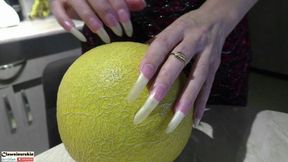 Nails in Action - nails scratching the melon hard