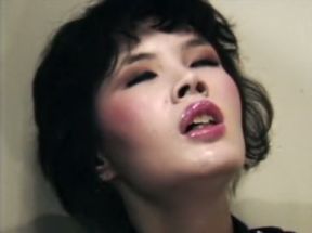 Unshapely oriental bitch masturbates for moustached cop