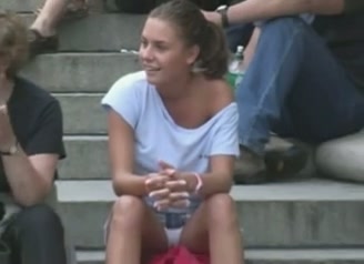 Filmed sexy upskirt of young tourist chick at the public park