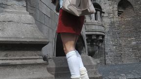 Smoking in red skirt